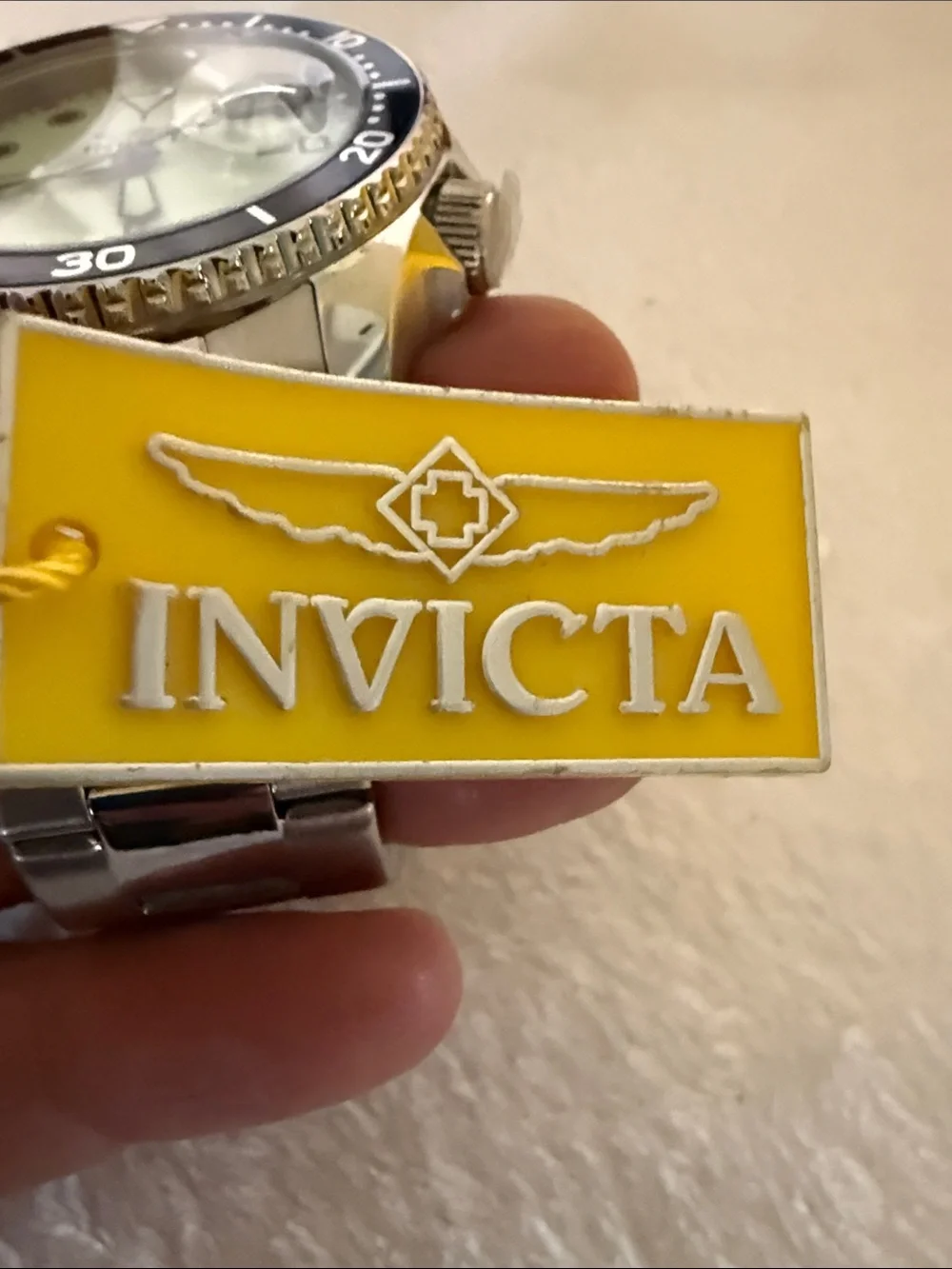Invicta Men's Silver Case Watch with Black Bezel and Luminous Green Dial
